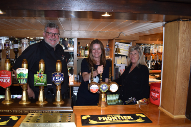 Chichester MP Gillian Keegan (centre) is championing local pubs through the PubAid Community Pub Hero Awards.   